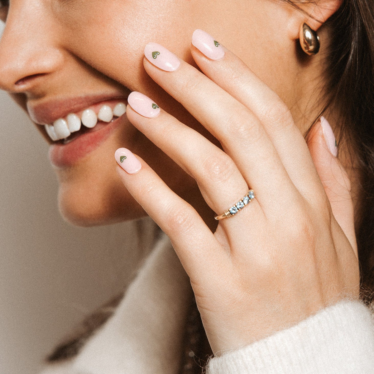 Minimal Crush Maniac Nails Light Pink with Green Heart nail art on hand with smile