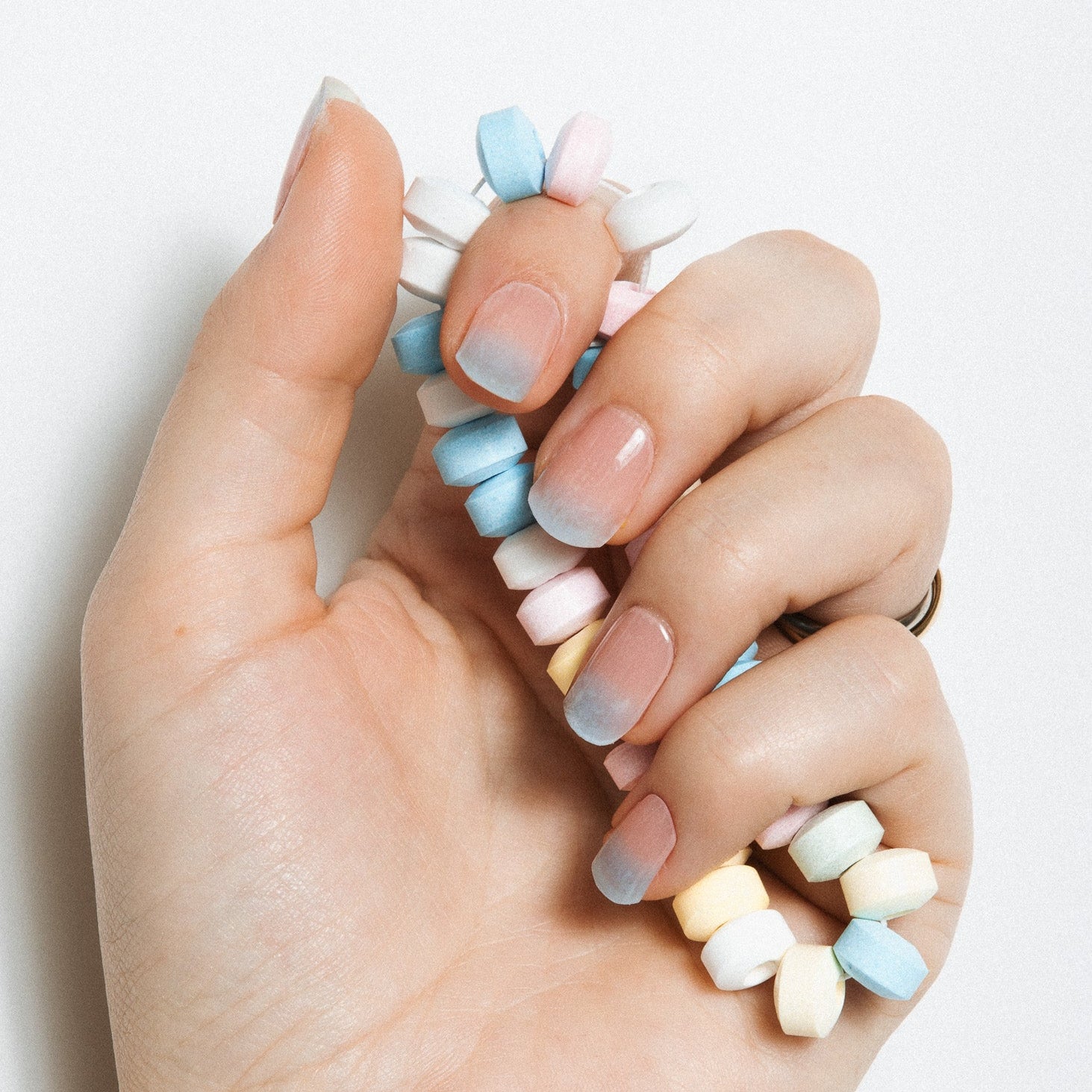Ocean Tips Candy Necklace Hand