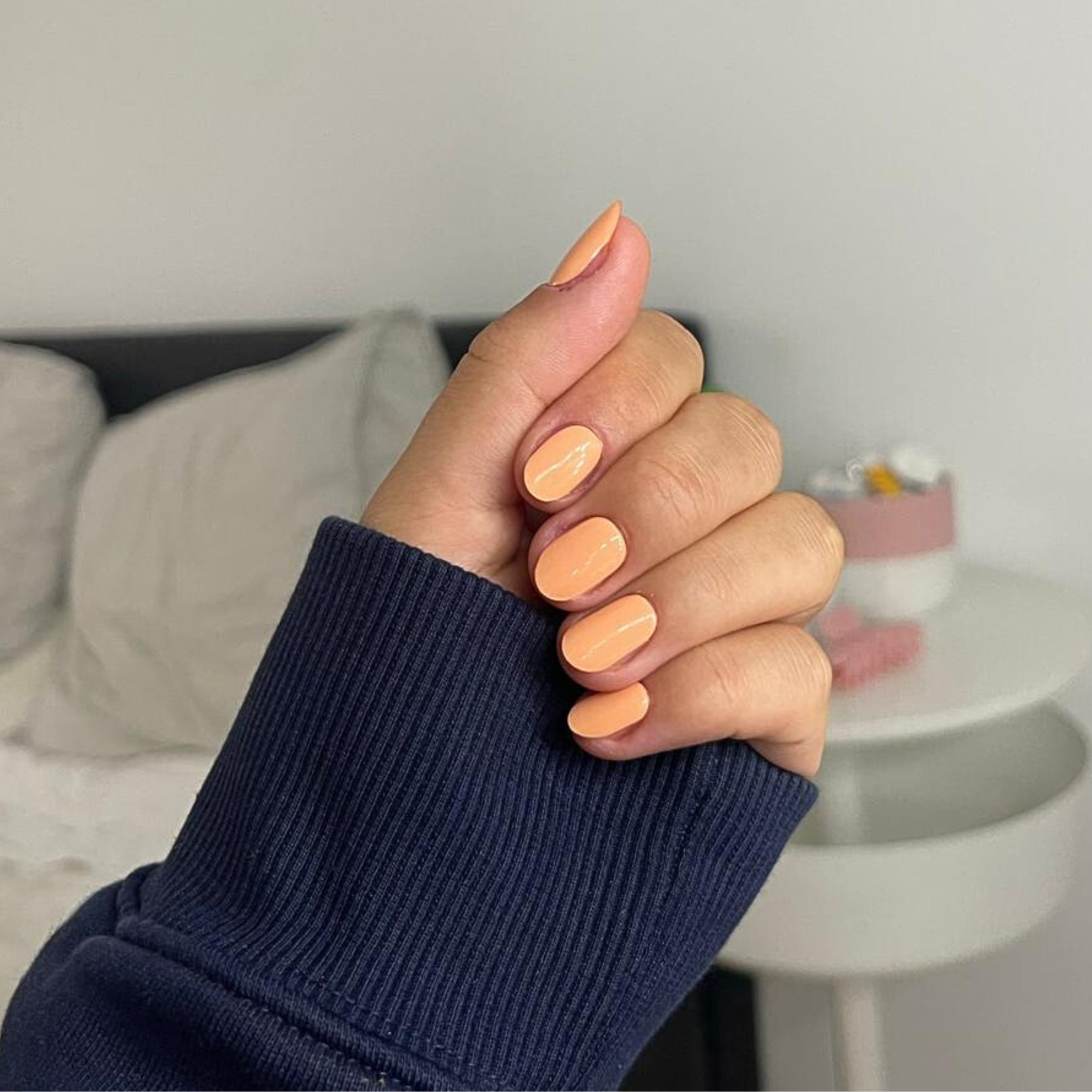 Candi Coral Orange Nails Blue Sweater 