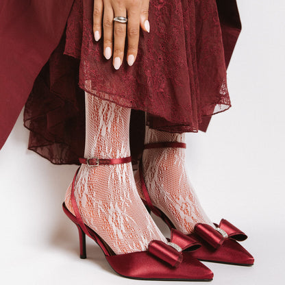 Family first Maniac Nails Anna Nooshin design light pink nails on hand with dark red 