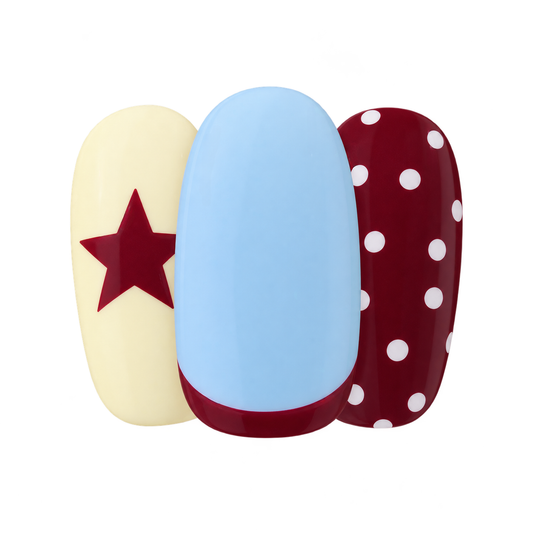 All In gel nail stickers by Maniac Nails, mix and match nails in cream with a star, baby blue and bordeaux with dots