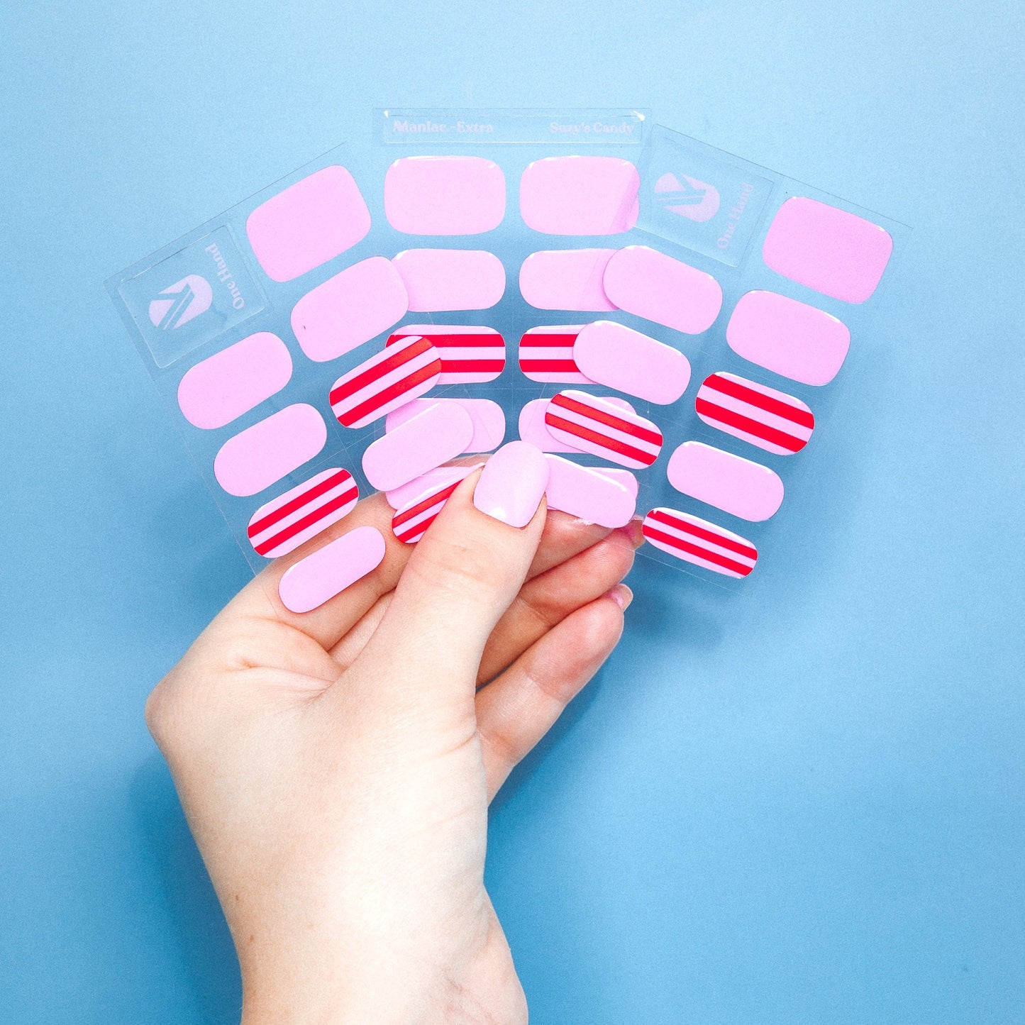 Suzy's Candy gel nail sticker sheets by Maniac Nails, pink and red striped nail wraps
