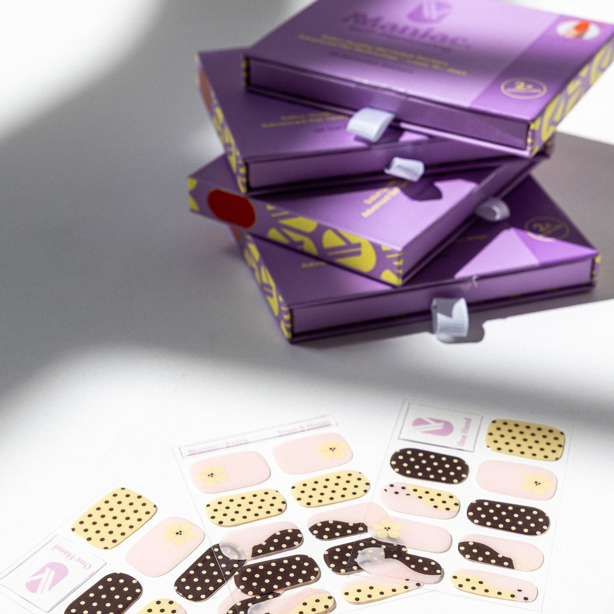 Toast and Honey gel nail sticker sheets by Maniac Nails, brown and cream nail wraps and packaging