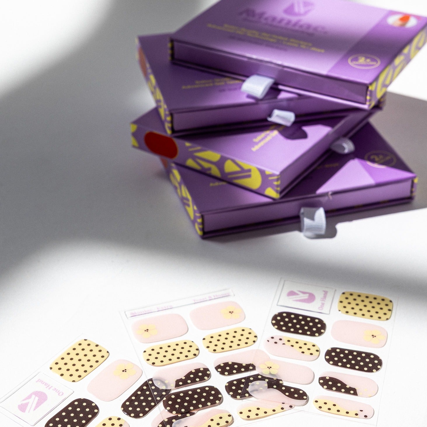 Toast and Honey gel nail sticker sheets by Maniac Nails, brown and cream nail wraps and packaging