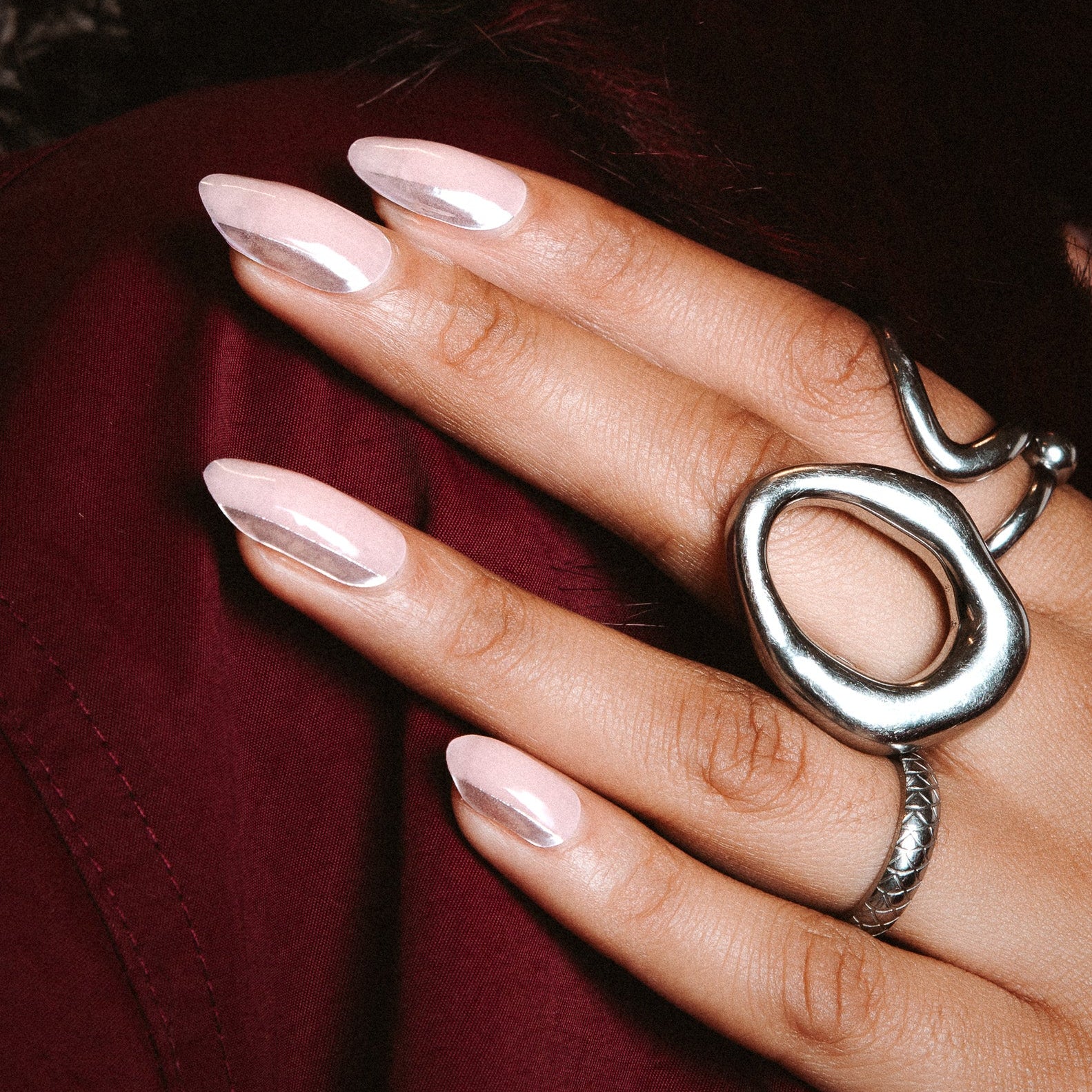 Vedder & Vedder Silver Strike Maniac nails gel manicure light pink with silver line on hand with silver rings