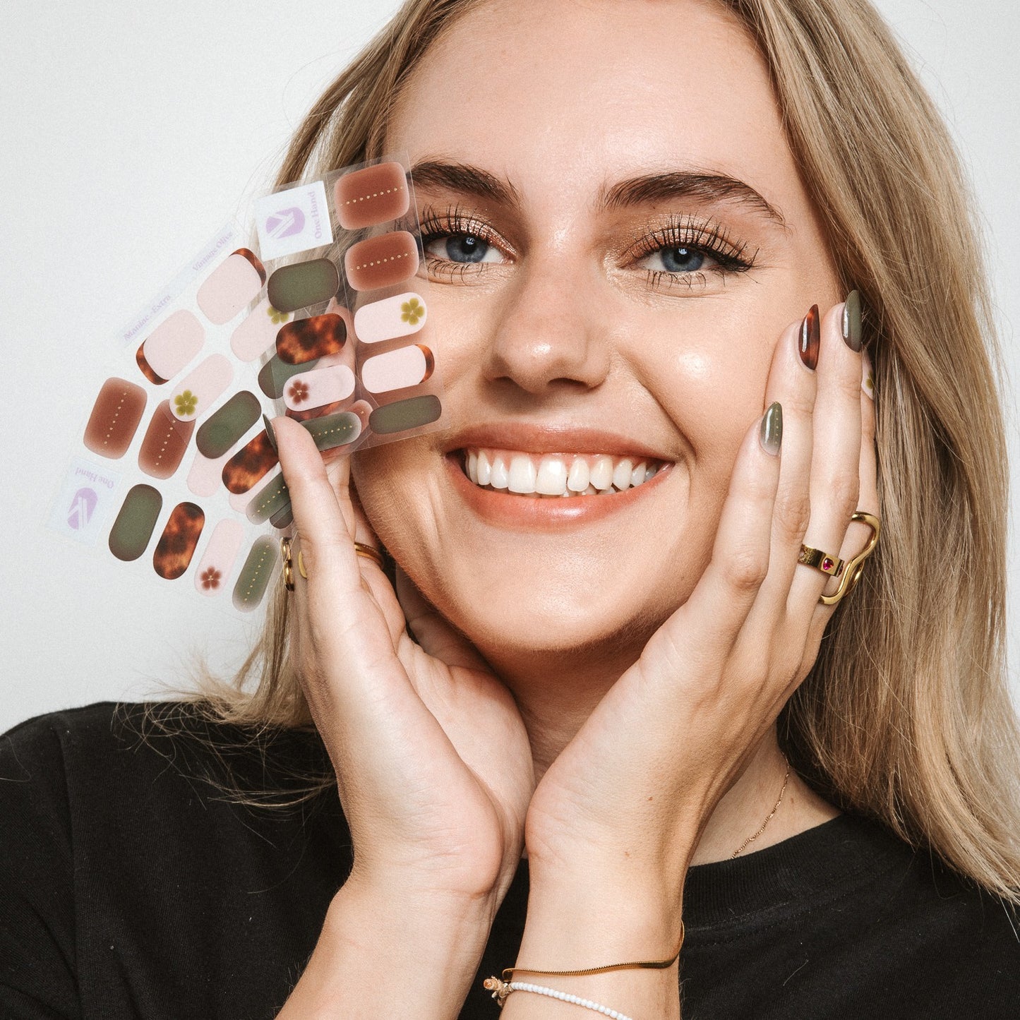 Model with Vintage Olive gel nail stickers by Maniac Nails, easy salon quality gel nails at home