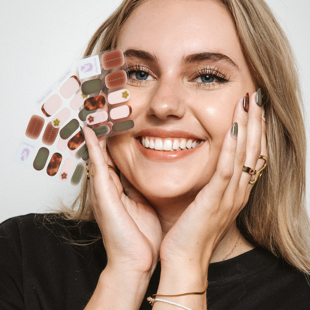 Model with Vintage Olive gel nail stickers by Maniac Nails, easy salon quality gel nails at home